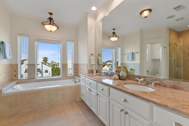 full bathroom with tile patterned flooring, vanity, toilet, and crown molding