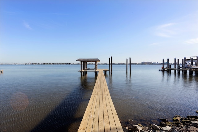 view of dock with a water view