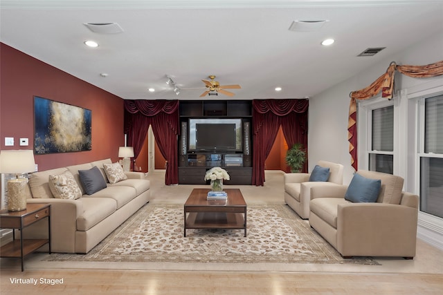 living room with ceiling fan