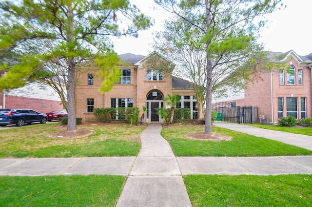 view of front of property with a front lawn