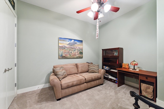 interior space with ceiling fan