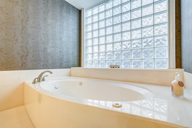 bathroom featuring a tub