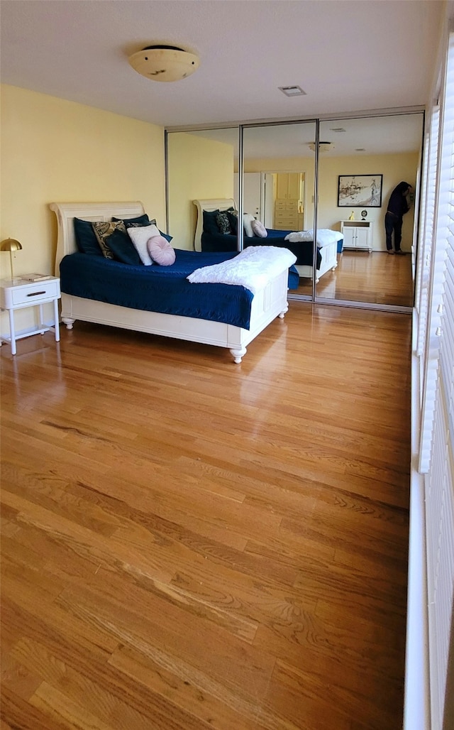 bedroom featuring hardwood / wood-style flooring