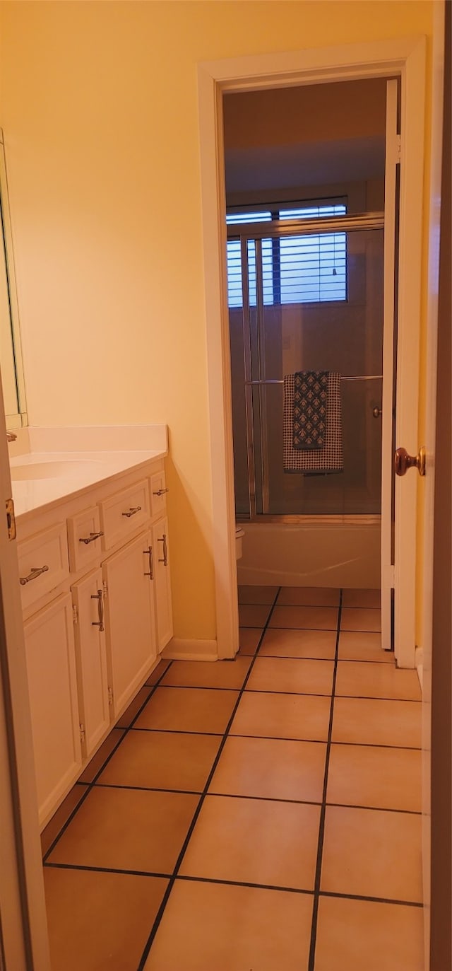 bathroom featuring tile patterned floors and vanity