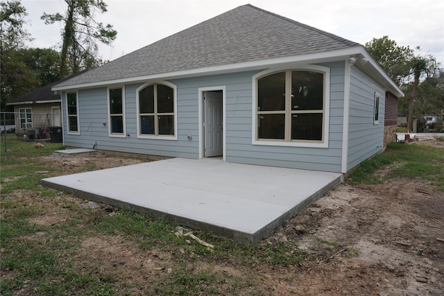 rear view of house featuring a patio