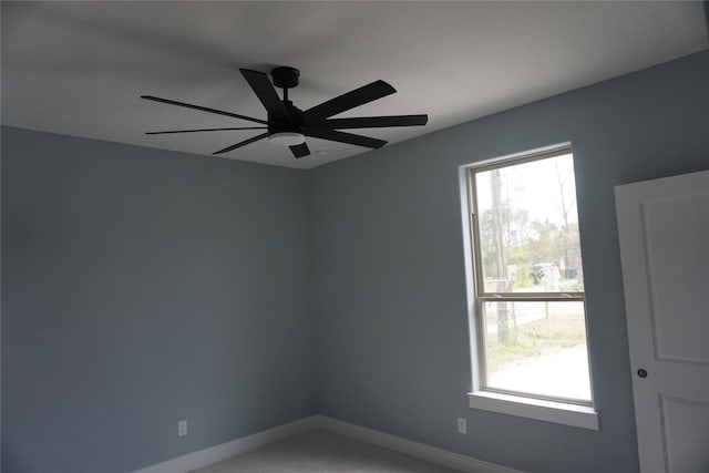 spare room with ceiling fan