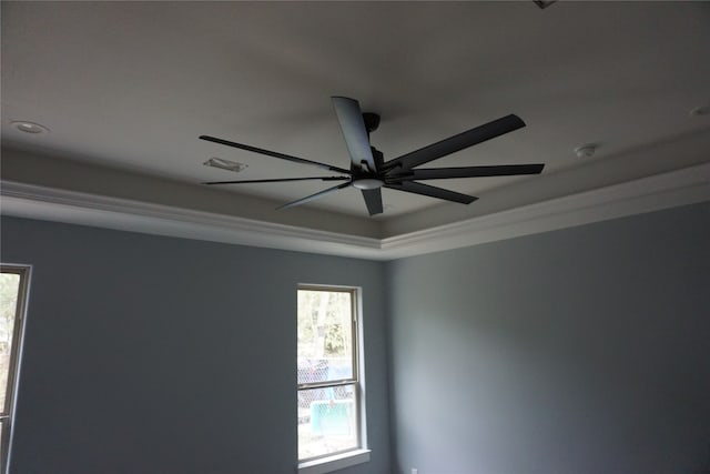 interior details featuring ceiling fan