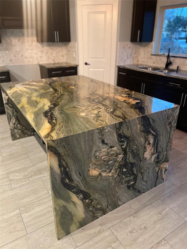 kitchen featuring sink and backsplash