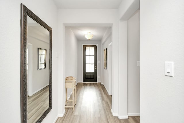 doorway featuring light hardwood / wood-style flooring