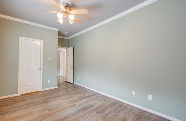 unfurnished bedroom with ceiling fan, light hardwood / wood-style floors, and ornamental molding