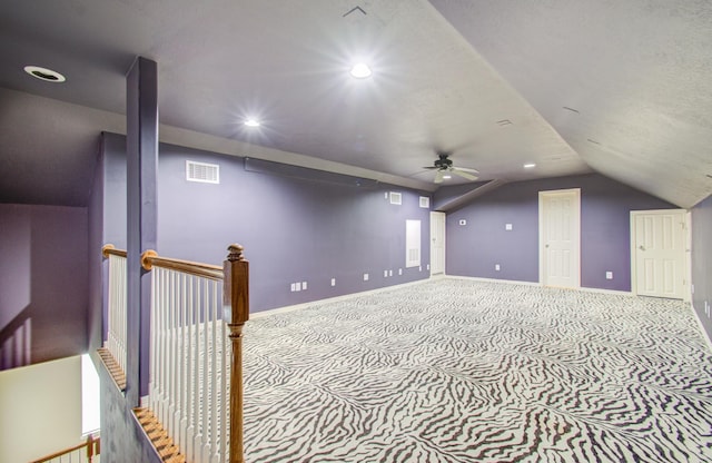 bonus room with carpet, ceiling fan, and vaulted ceiling