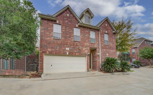 front of property with a garage