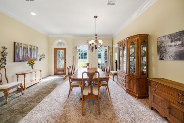 dining area with a chandelier and ornamental molding