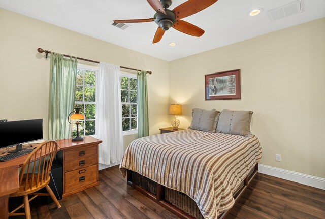 bedroom featuring ceiling fan and dark hardwood / wood-style flooring