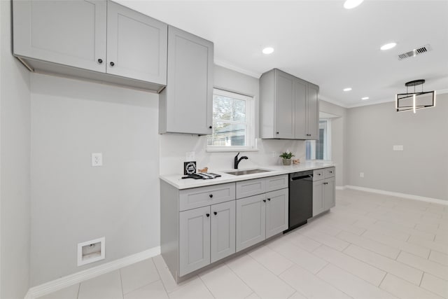 kitchen with pendant lighting, dishwasher, gray cabinetry, sink, and ornamental molding