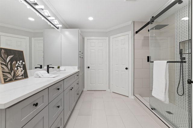 bathroom featuring walk in shower, tile patterned flooring, vanity, and ornamental molding