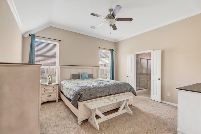 bedroom featuring ceiling fan, light colored carpet, ornamental molding, and vaulted ceiling