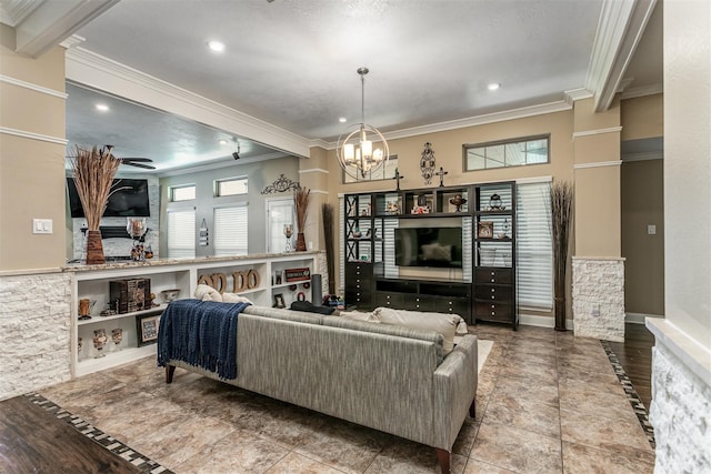 living room with tile patterned floors, a notable chandelier, and crown molding