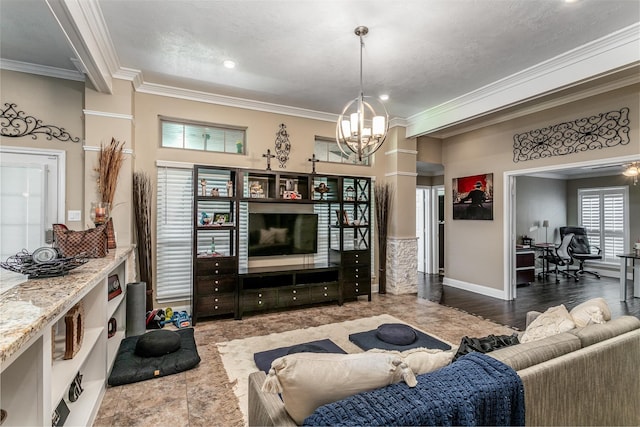 living room with dark hardwood / wood-style flooring, an inviting chandelier, and ornamental molding