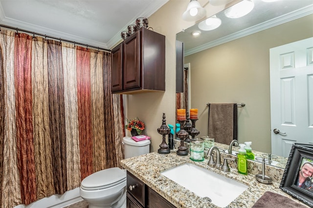 bathroom featuring vanity, toilet, and ornamental molding