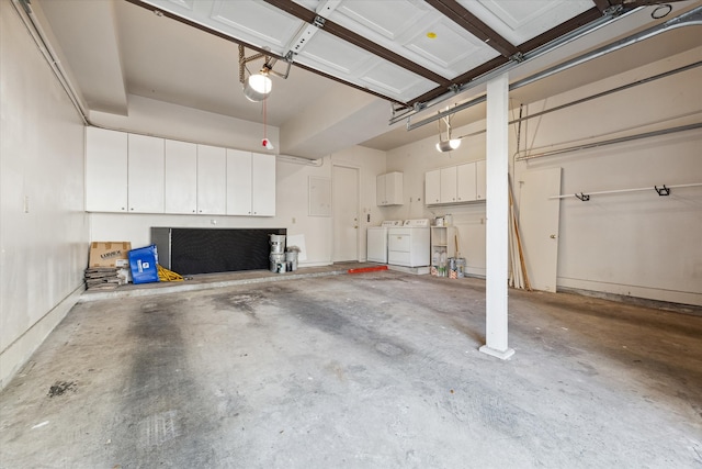 garage with washing machine and dryer