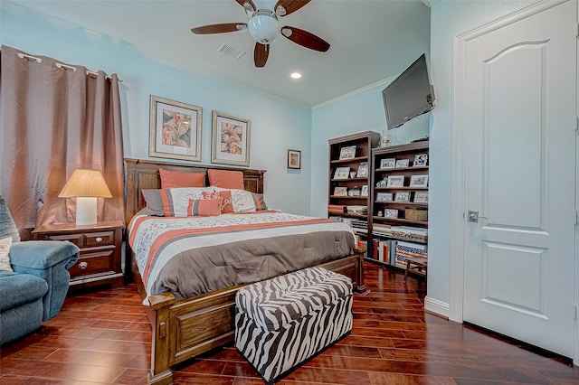 bedroom with dark hardwood / wood-style flooring, ceiling fan, and crown molding