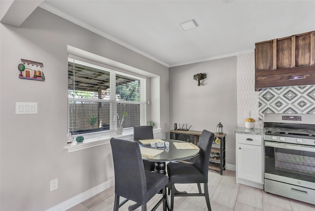 dining space featuring ornamental molding