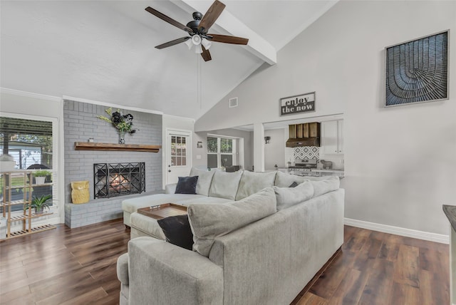 living room featuring ceiling fan, a fireplace, dark wood-type flooring, and vaulted ceiling