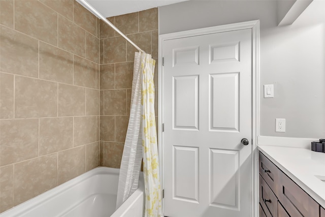 bathroom featuring shower / bath combination with curtain and vanity