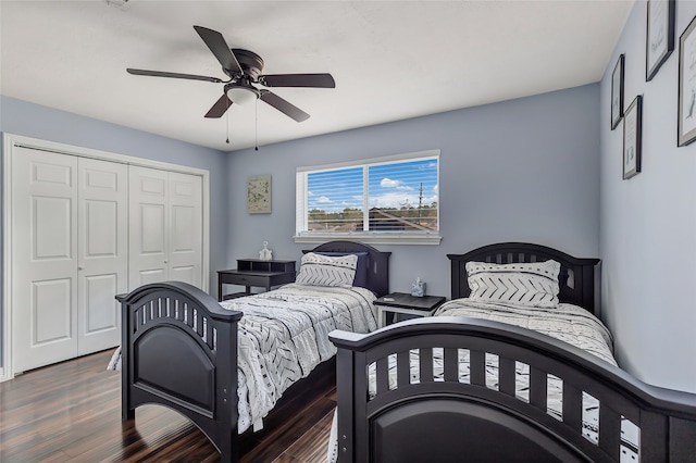 bedroom with ceiling fan, a closet, and dark hardwood / wood-style floors