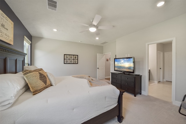 carpeted bedroom featuring ceiling fan