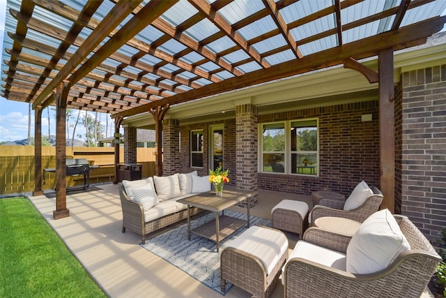 view of patio / terrace featuring a pergola and an outdoor hangout area