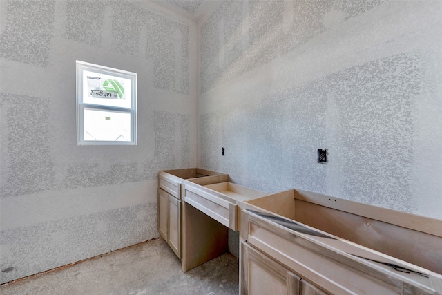 bathroom featuring concrete flooring