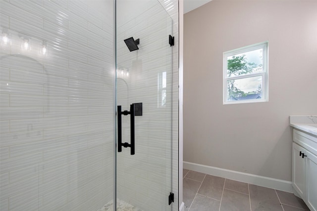 24601 Tipperary St, Hempstead, TX 77445 - full bath with baseboards, a tile shower, and vanity