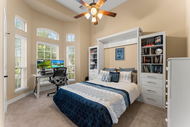 bedroom featuring a ceiling fan, carpet flooring, baseboards, and visible vents