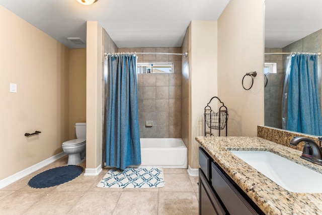 full bathroom featuring shower / bath combo with shower curtain, tile patterned flooring, vanity, and toilet