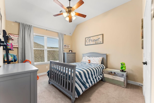 bedroom with baseboards, lofted ceiling, light colored carpet, and ceiling fan