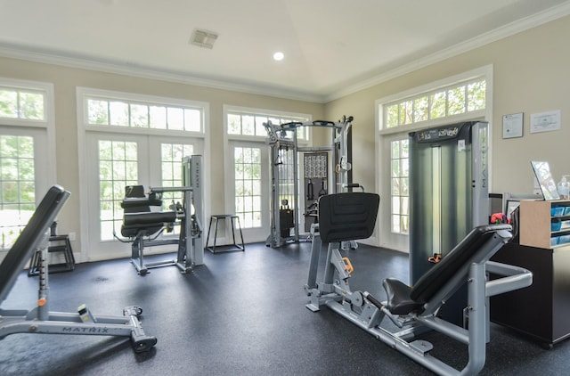 exercise room featuring visible vents, french doors, baseboards, and ornamental molding