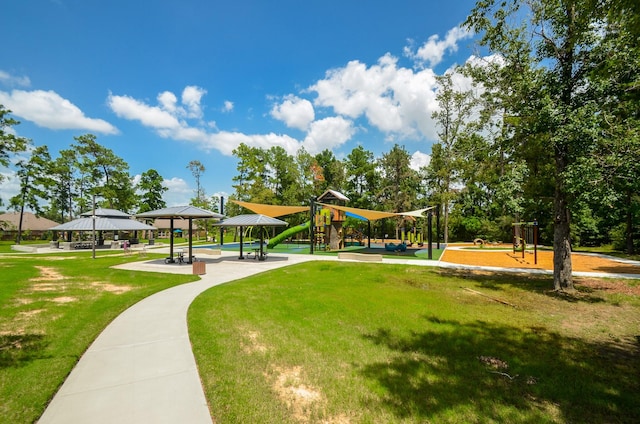 surrounding community with a gazebo, playground community, and a lawn