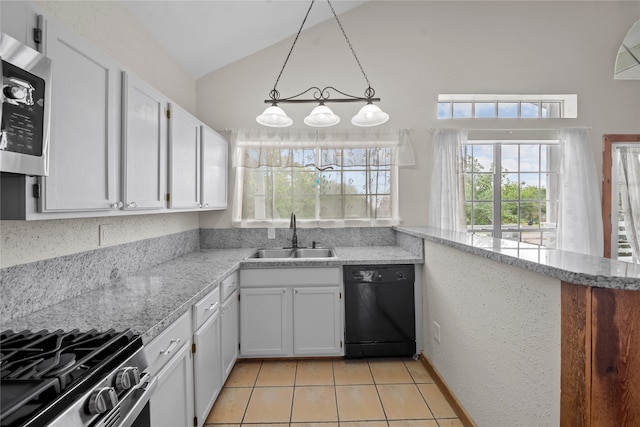 kitchen featuring vaulted ceiling, pendant lighting, white cabinetry, sink, and stainless steel appliances