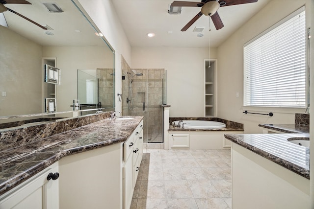 bathroom with separate shower and tub, ceiling fan, and vanity