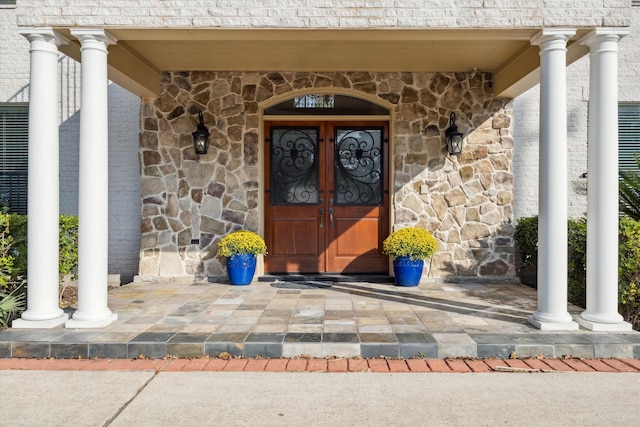 doorway to property featuring french doors