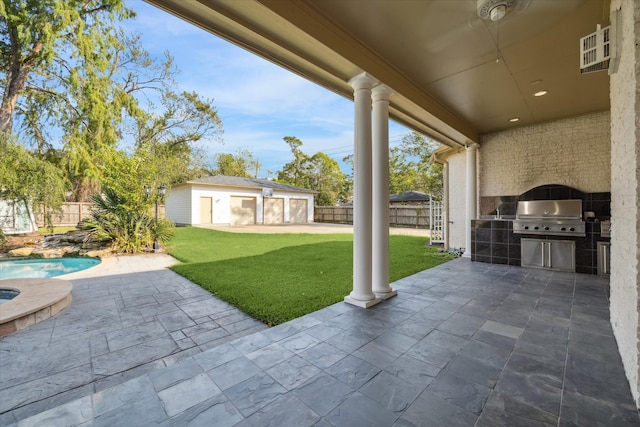 view of patio / terrace with area for grilling, a fenced in pool, and an outdoor structure