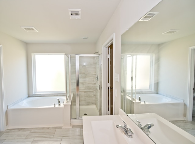 bathroom featuring plus walk in shower