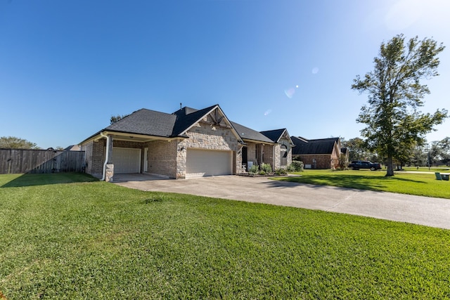 view of front facade featuring a garage and a front yard