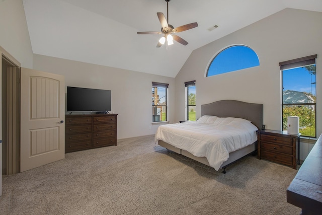 bedroom featuring carpet, high vaulted ceiling, and ceiling fan