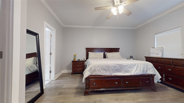 bedroom featuring light wood-style floors, ceiling fan, baseboards, and crown molding