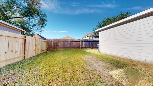 view of yard featuring a fenced backyard