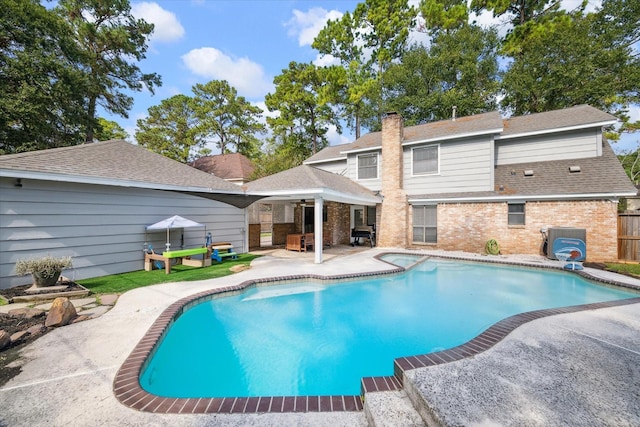 view of pool with a patio