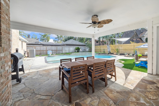 view of patio featuring a fenced in pool, central AC unit, grilling area, and ceiling fan